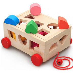 Pulling a 15 hole car intelligence box for children aged 0-3, shape matching of educational toys, baby color recognition building blocks